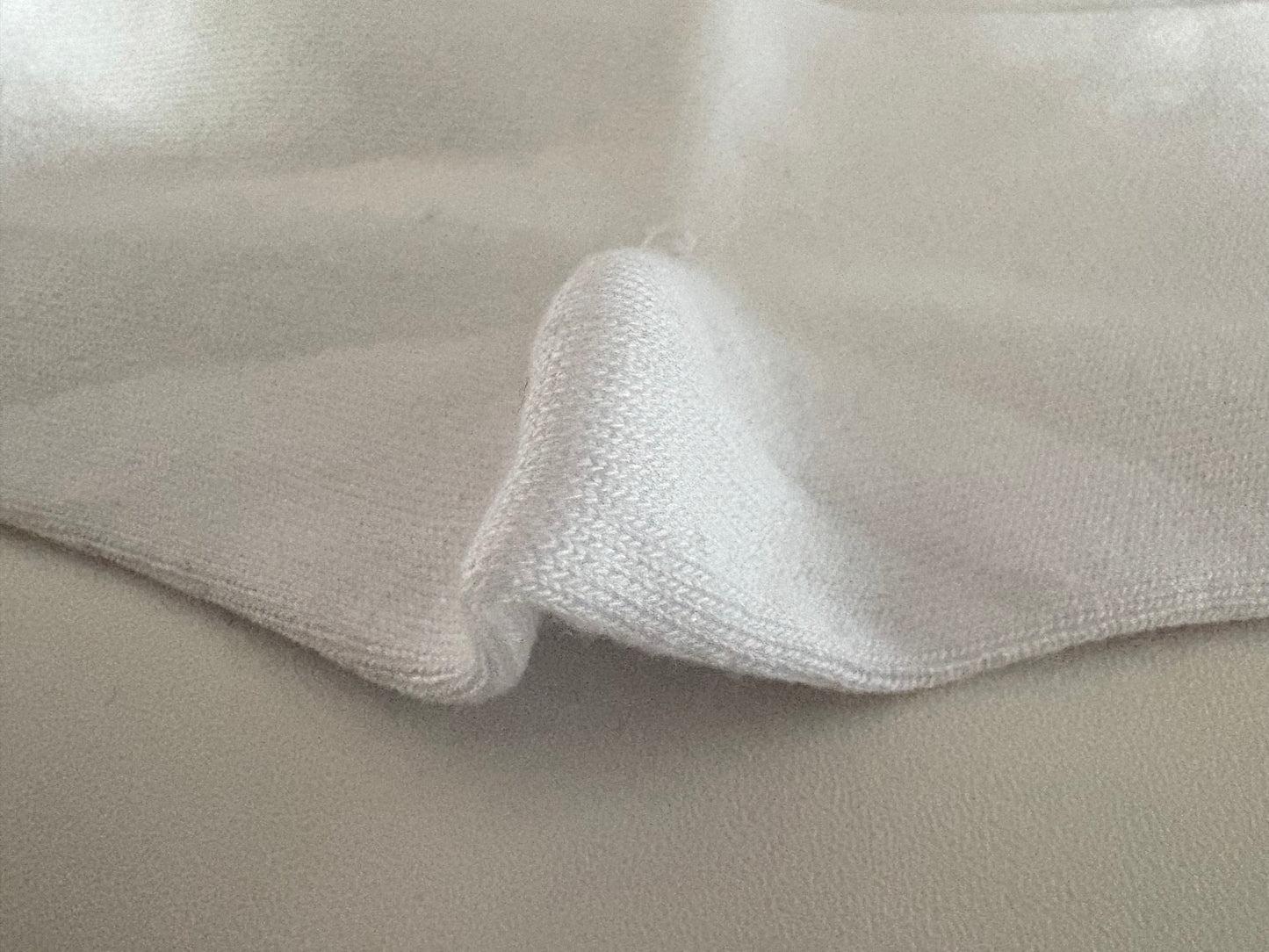 Close-up of a textured fabric surface with a focus on texture and color.