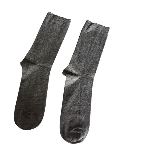 Pair of gray socks on a white background
