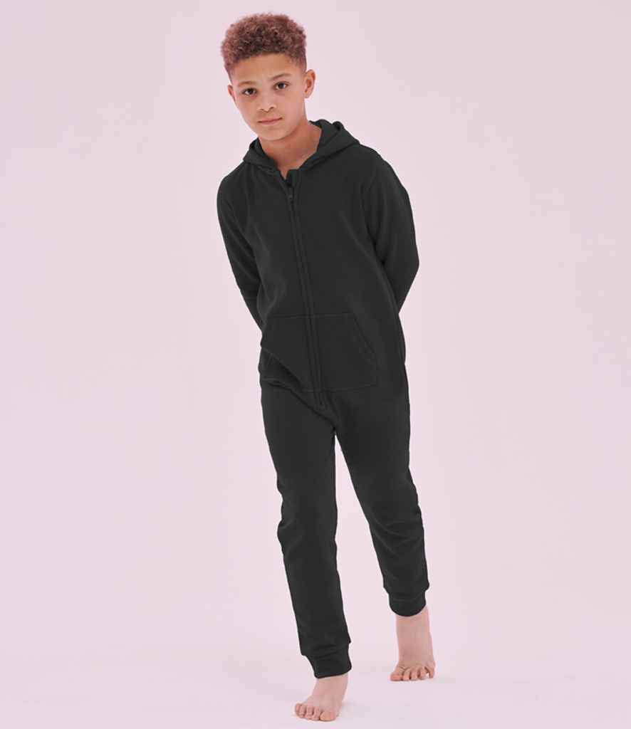 Person wearing a black onesie against a white background