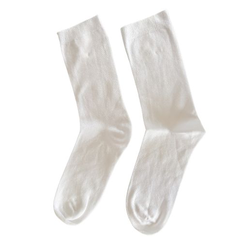 Pair of white socks on a white background
