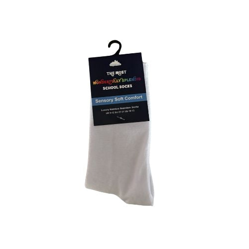White socks on a white background with a label indicating 'School Socks' and 'Sensory Soft Comfort'.