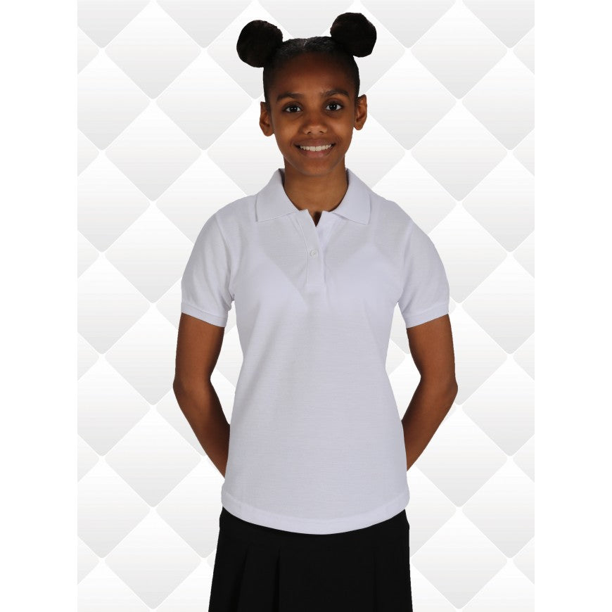 Person wearing a white polo shirt against a white geometric patterned background