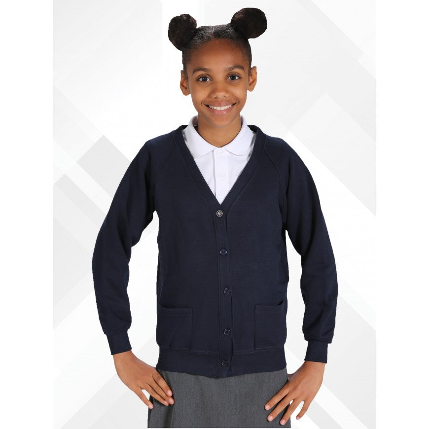 Child wearing a navy cardigan over a white shirt with a gray skirt on a white background